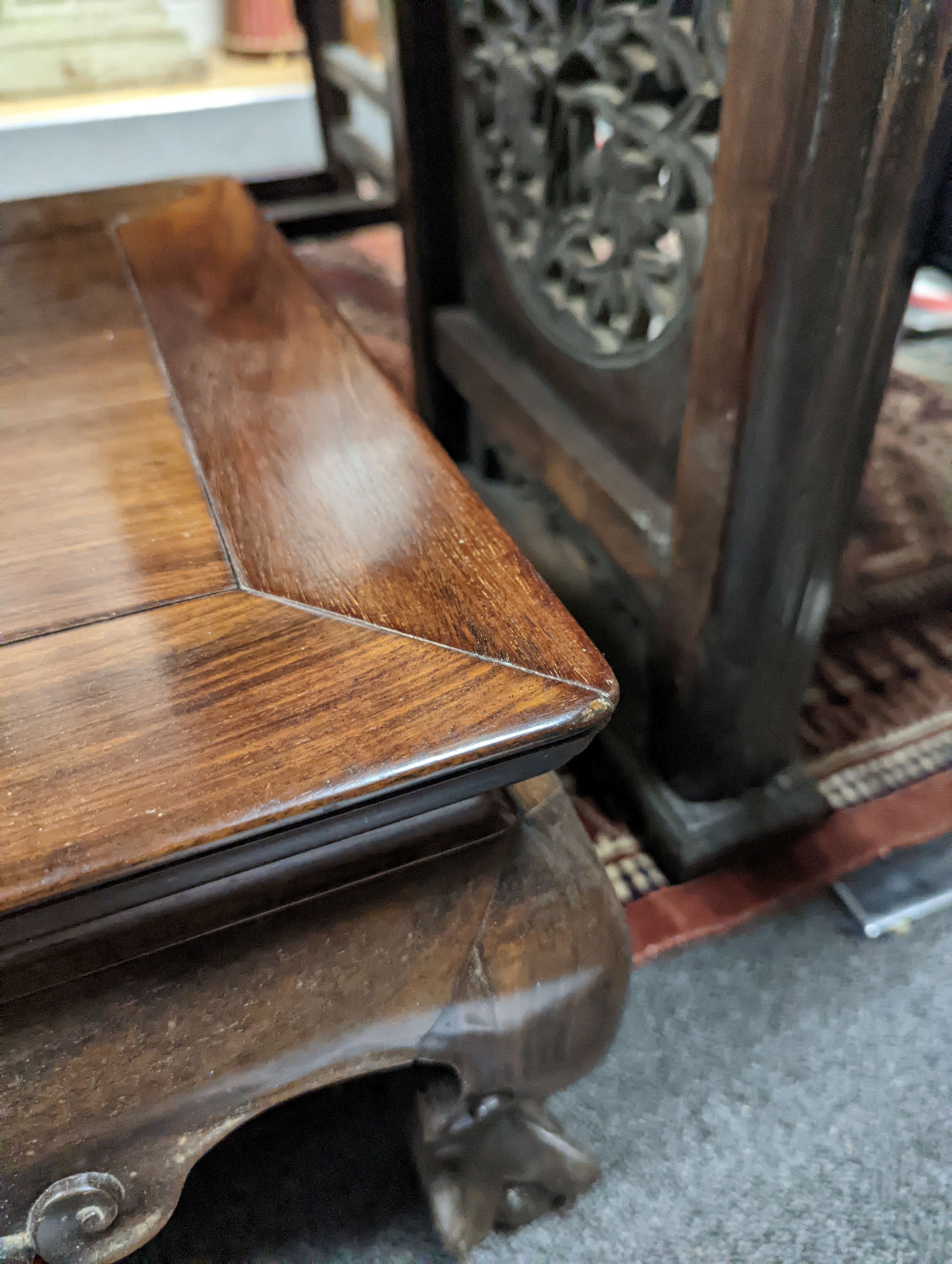 A Chinese hongmu Kang table, 19th century, 79 cm long, 43 cm wide, 27 cm high, old repairs